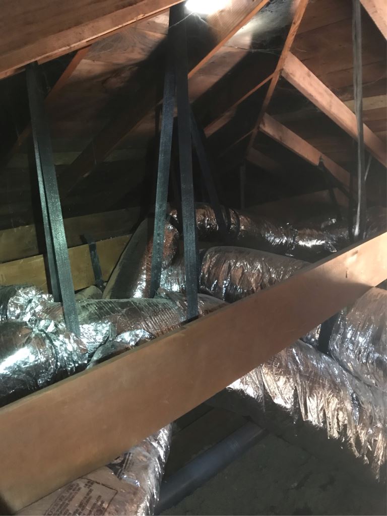 Furnace installation/replacement with 95% efficiency furnace in the garage in Palo Alto, California