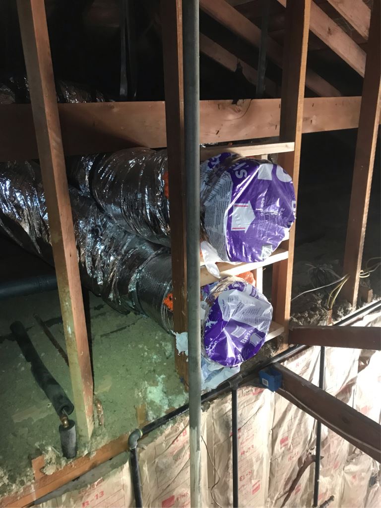 Furnace installation/replacement with 95% efficiency furnace in the garage in Palo Alto, California