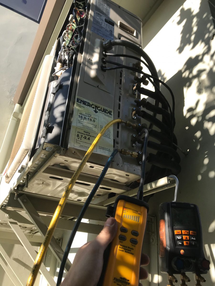 Search for freon leakage using a leak detector in San Jose, California