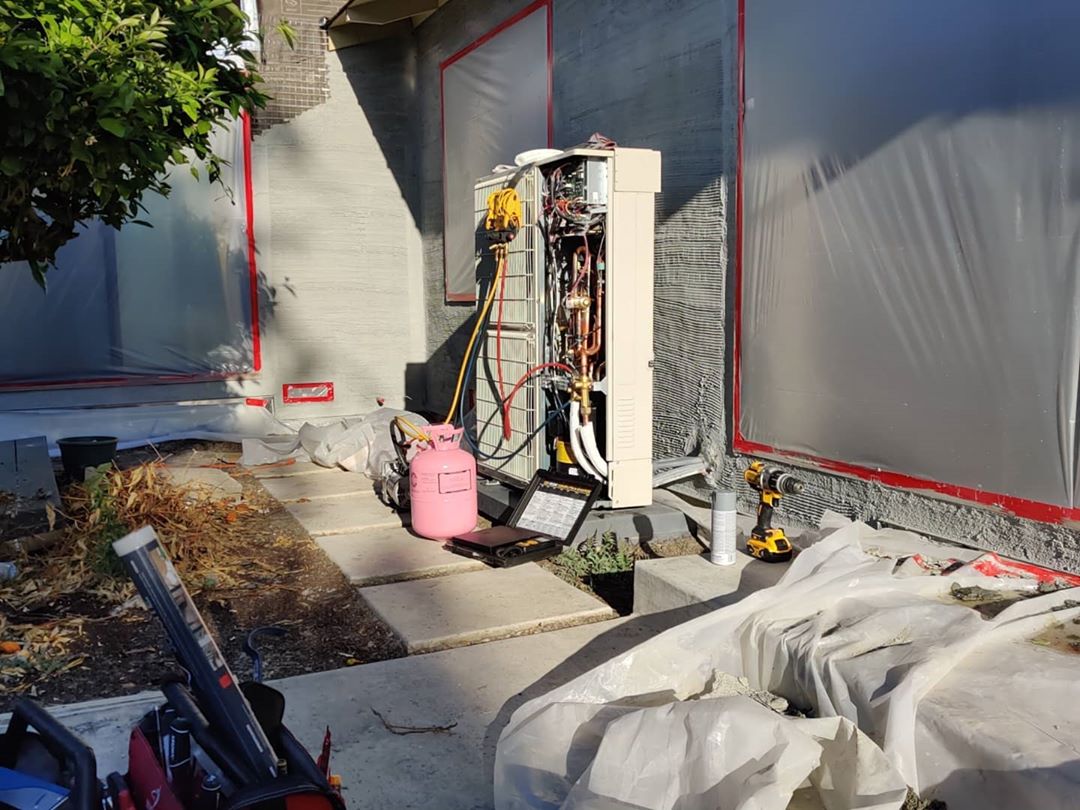 Easy-peasy. DIY kit from Mitsubishi. 8 multizone, 2 branch boxes, 160 ft of linesets, 8 indoor units, 1 outdoor unit, 4 days, 3 guys.