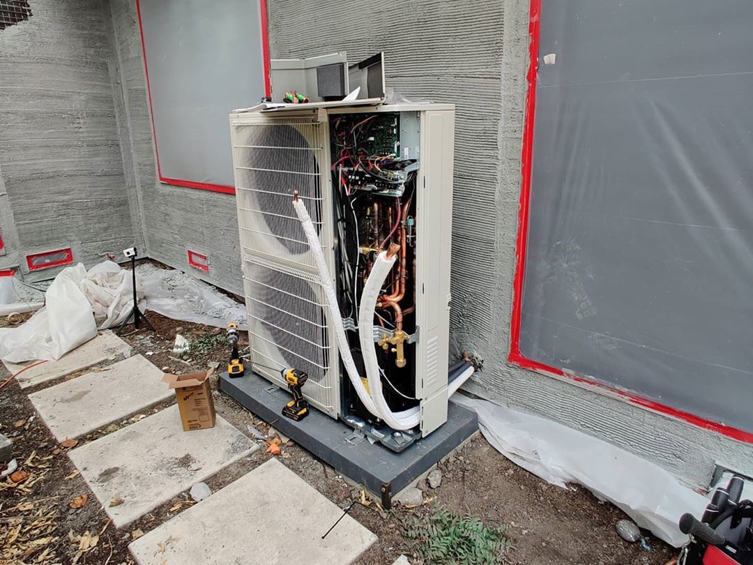 Easy-peasy. DIY kit from Mitsubishi. 8 multizone, 2 branch boxes, 160 ft of linesets, 8 indoor units, 1 outdoor unit, 4 days, 3 guys.